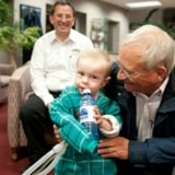 Volunteers share a moment with a Make-A-Wish child in Montana