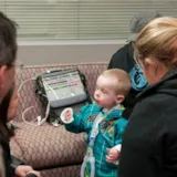 Family and Judah 1 volunteers care for a Make-A-Wish child