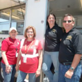 Relief volunteers gather at Red Cross unit in Wellston, OK