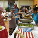 Volunteers share a meal during Honduras medical mission