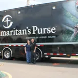 Judah 1 mission personnel at Samaritan’s Purse trailer in Monroe