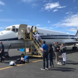 Mission team boards aircraft for Anchorage children's center