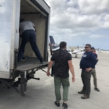 Relief team loading at Bahamas airport after Hurricane Dorian