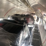 Shrink-wrapped relief supplies loaded in an aircraft cabin