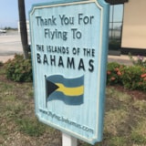 Airport sign welcoming arrivals to the islands of the Bahamas