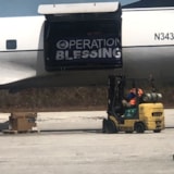 Bahamas relief: forklift loads cargo into aircraft after Dorian
