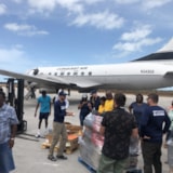 Hurricane Dorian relief team unloads supplies from aircraft