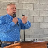 Speaker addresses a local gathering during Juárez aid outreach