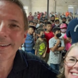 Volunteers meet children at a relief gathering in Juárez