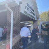 Volunteers unload relief supplies at Florida church after Helene
