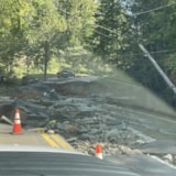 Flood-damaged road and washout after Hurricane Helene in Florida