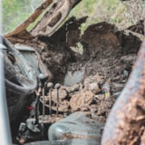 Mud-choked vehicle interior after Kerrville, Texas flooding