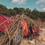 Flood debris tangled on a wrecked vehicle in Kerrville, Texas