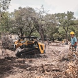 Relief team clears flood debris with heavy equipment in Kerrville