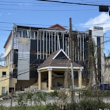 Hurricane Melissa leaves a Jamaica building and lines damaged