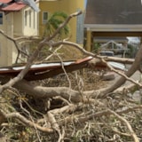 Hurricane Melissa debris blocks a building entrance in Jamaica