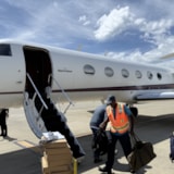 Relief team unloads supplies from jet for Jamaica hurricane aid