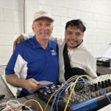 Mission personnel set up sound equipment for outreach in Juárez