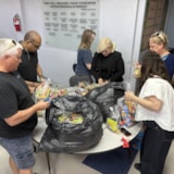 Judah 1 volunteers pack care bags in Juárez for families