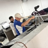 Judah 1 volunteers set up audio and video gear in Juárez