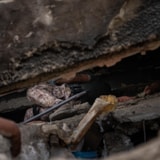 Rescue workers search collapsed rubble after Venezuela quake