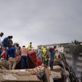 Relief teams search collapsed buildings after Venezuela quakes