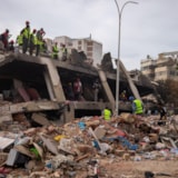 Rescue teams search collapsed building in Venezuela after quakes