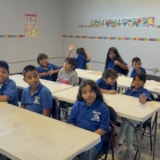 Students in a Juárez classroom during a daily lesson