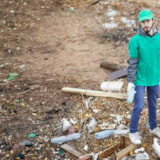 Relief volunteers clear debris to support recovery efforts