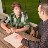 Scripture study and counsel during a ministry support visit