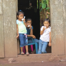Children in a doorway during Honduras community medical outreach