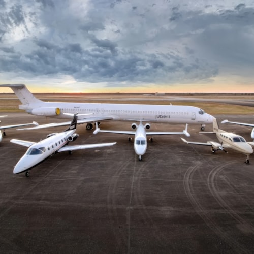 Judah 1 fleet lined up on the ramp, from jets to airliner