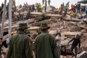 Responders search collapsed buildings after Venezuela quakes
