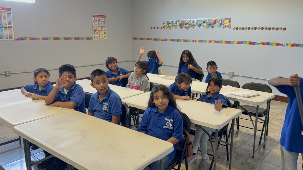 Students in a Juárez classroom during a daily lesson