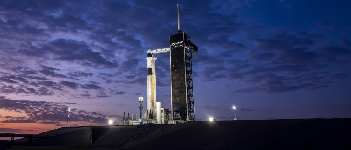 SpaceX rocket on the launch pad before liftoff at daybreak